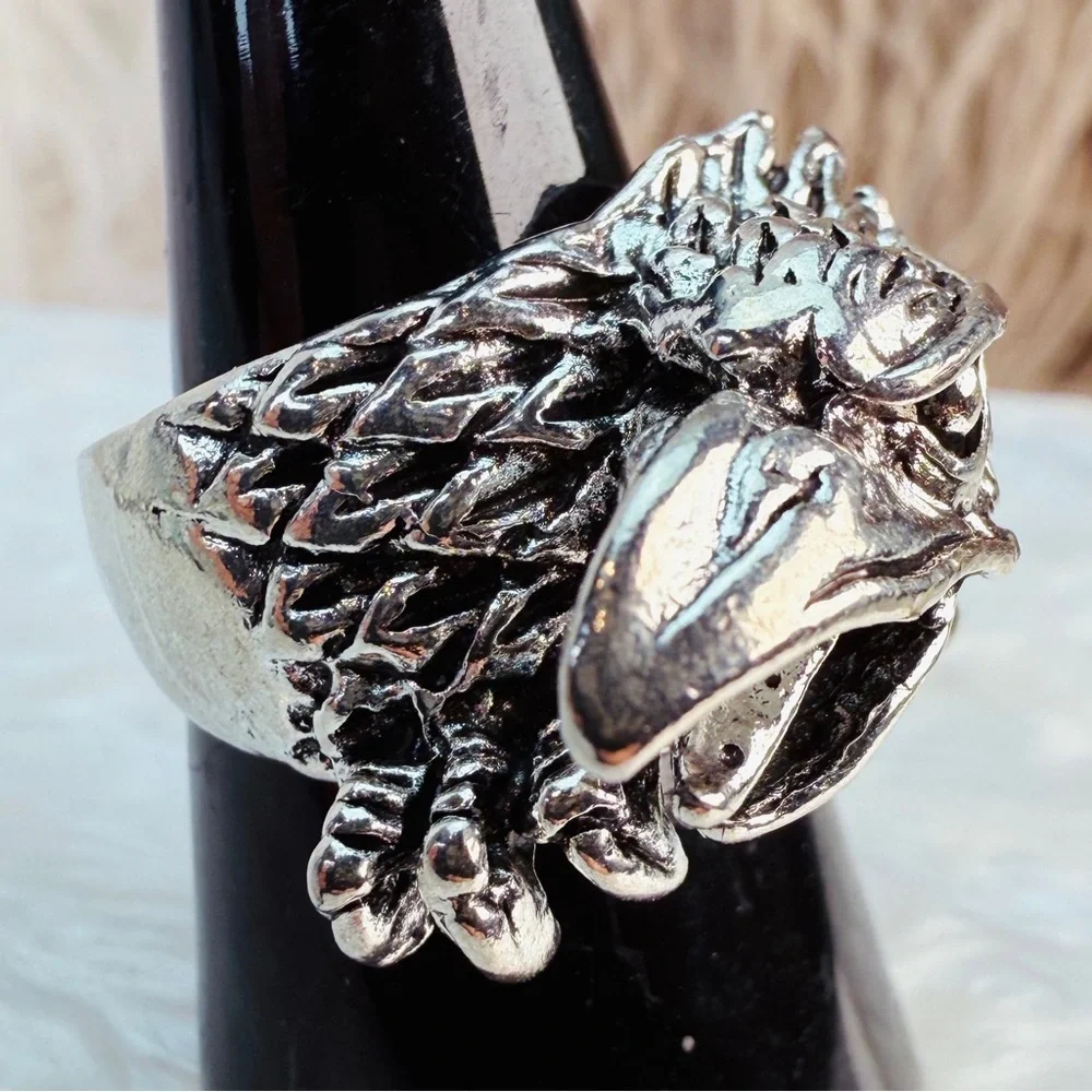 Interesting Silvertone raised eagle or dragon costume ring